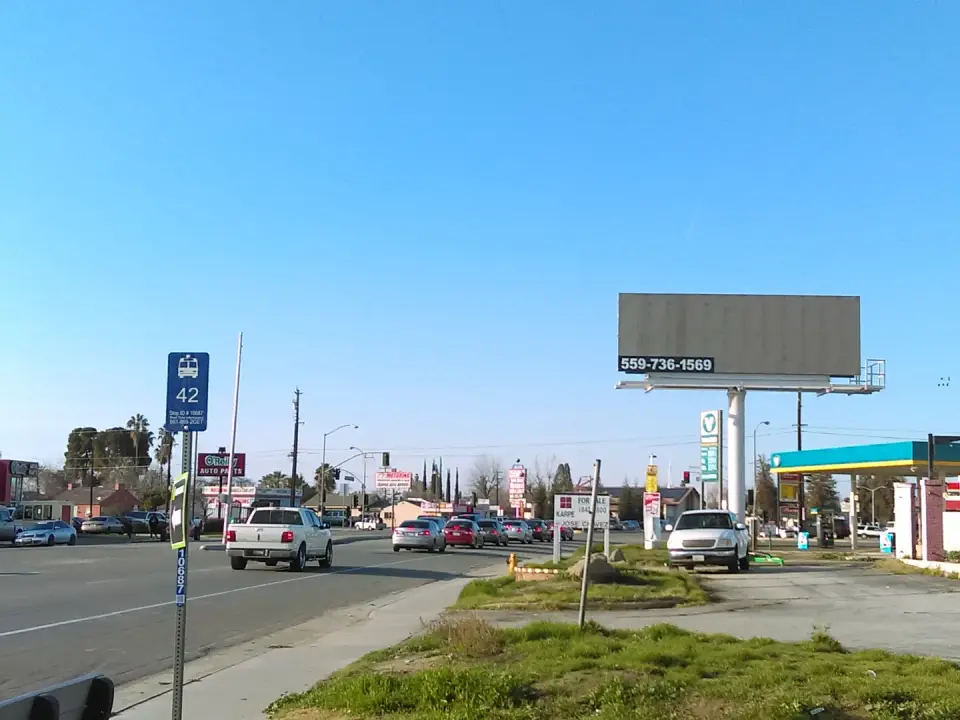 Blank billboard overlooking traffic near Chester Avenue and Ming Avenue