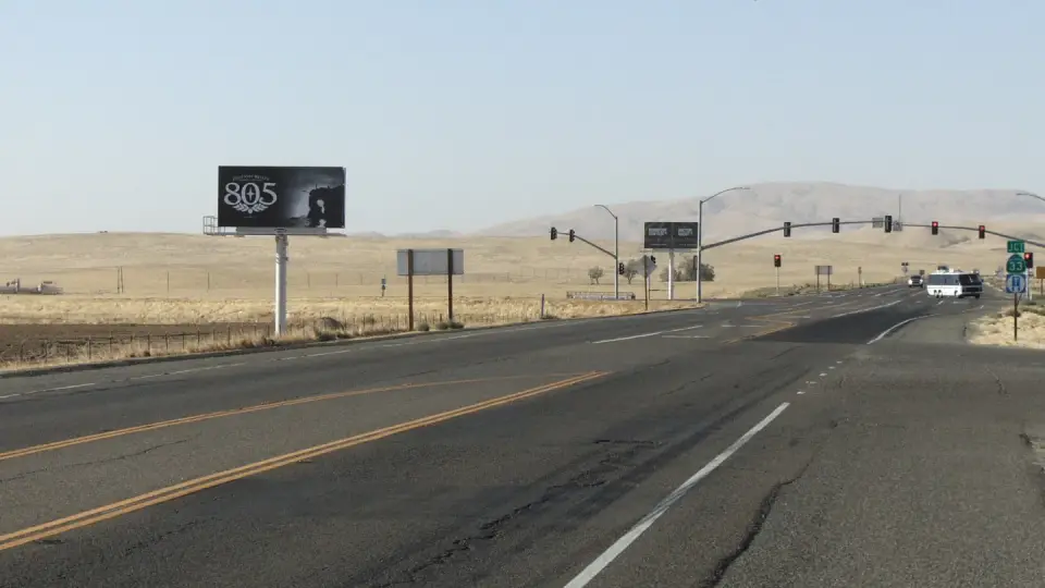 805 Beer billboard at a rural Highway 41 and 33 intersection