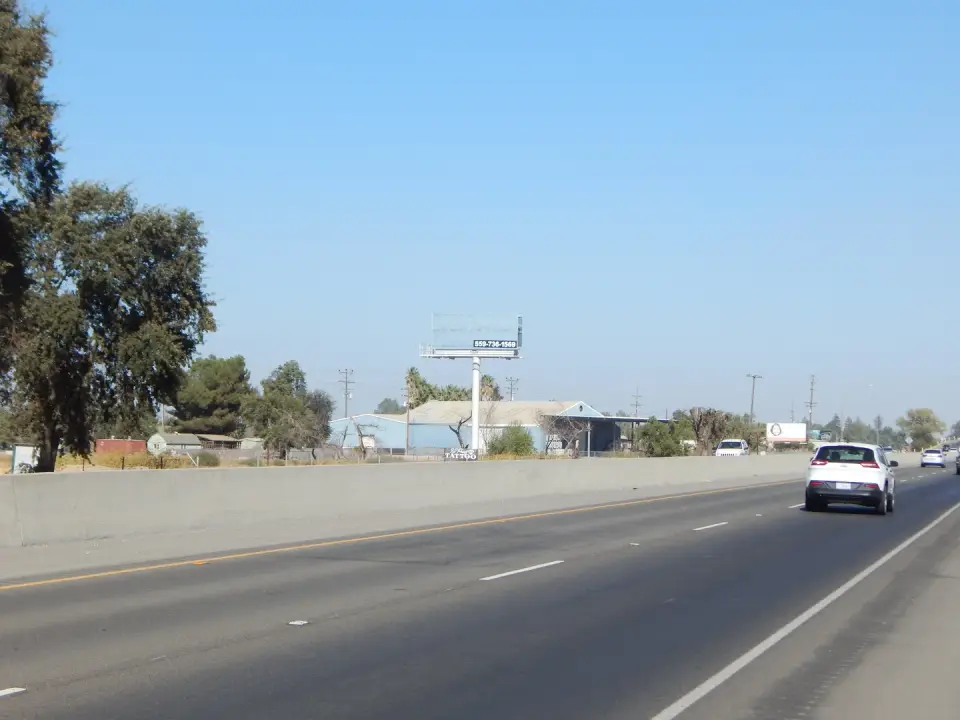 Billboard viewed from a vehicle on Highway 43 near Hanford