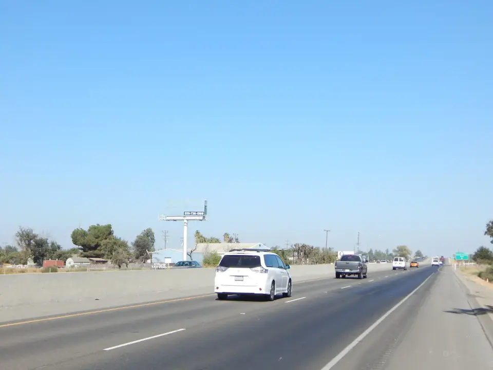 Blank billboard on the open Highway 43 approach to Hanford