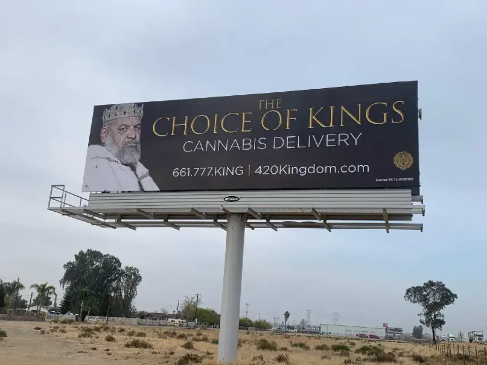 Static billboard beside Highway 58 east of Bakersfield