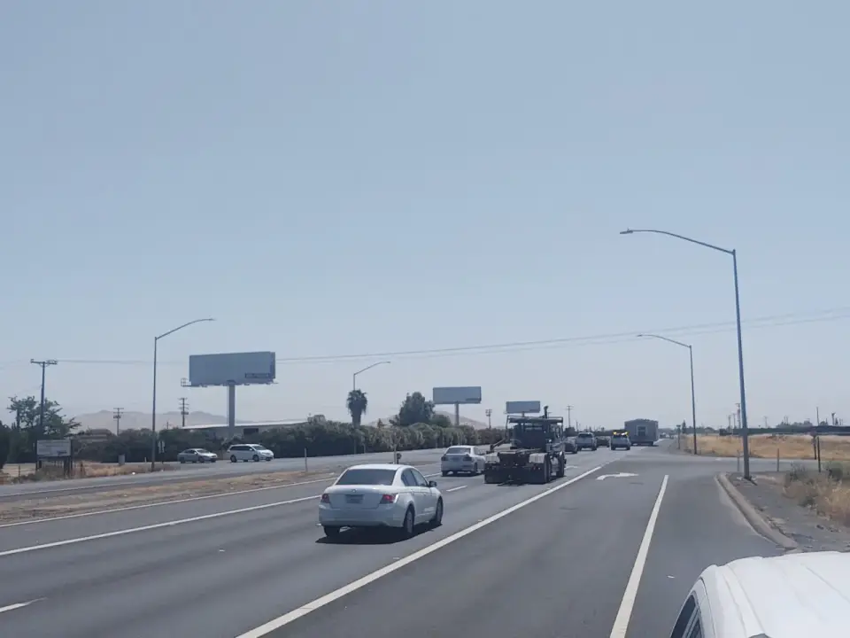 Blank billboard beside southbound Highway 65 near Porterville