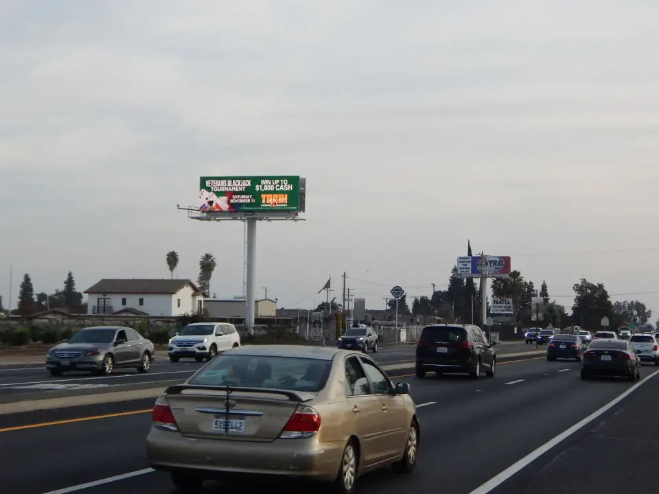 Double-sided local advertising billboard on Mooney Boulevard