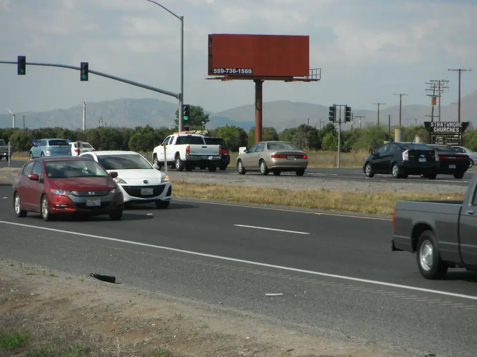 Red blank billboard at a traffic signal near Strathmore
