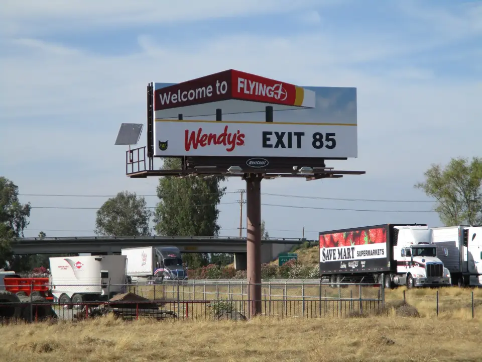 Wendy’s and Flying J Exit 85 billboard beside Highway 99 in Tipton