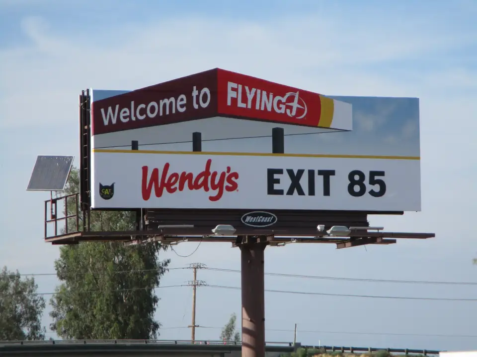 Close view of the Wendy’s and Flying J Exit 85 billboard in Tipton